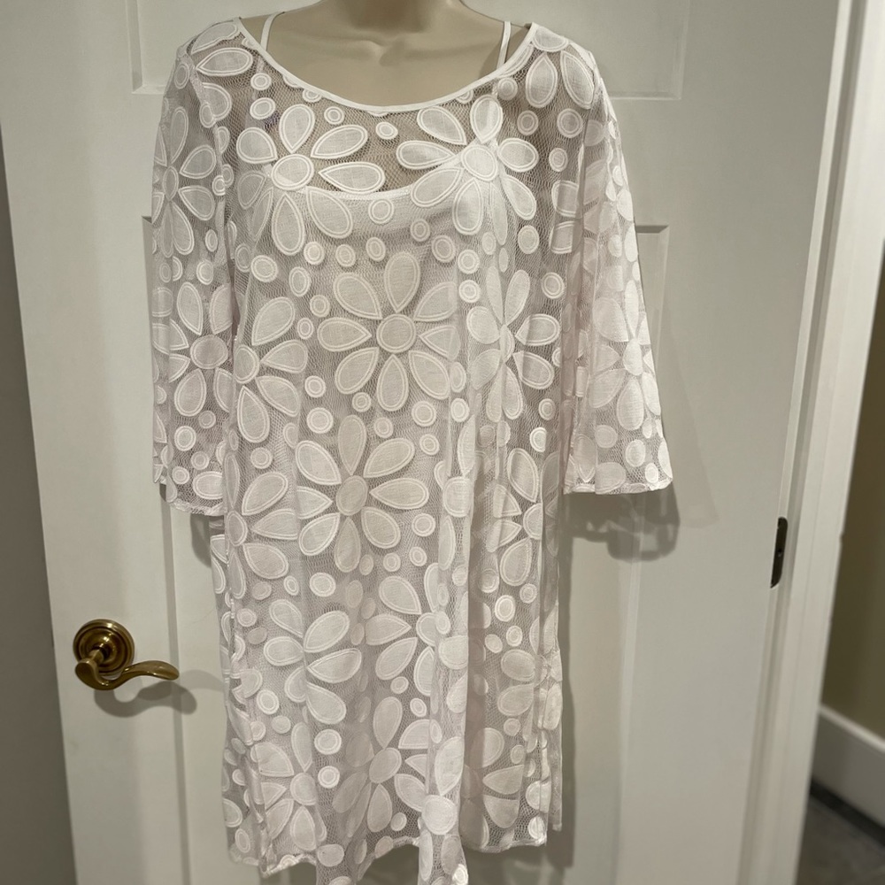 White lace dress worn once to a beach wedding